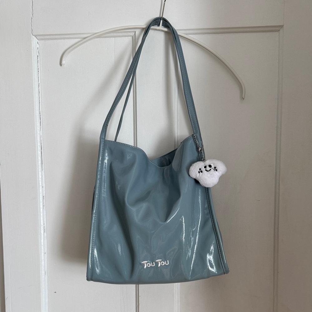 Tou Tou Glossy Blue Shoulder Bag with Adorable Charm